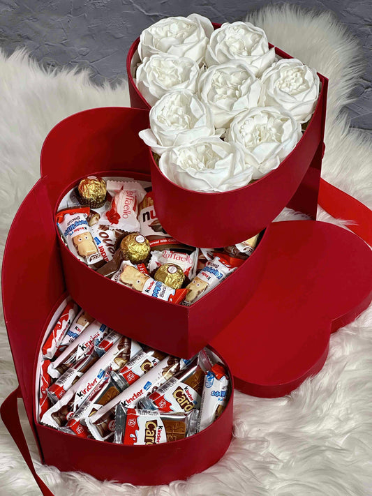 Three-tiered red gift box featuring 8 soap peonies, Raffaello candies, and a selection of Kinder treats, including Bueno and Happy Hippo. A luxurious gift for special celebrations.